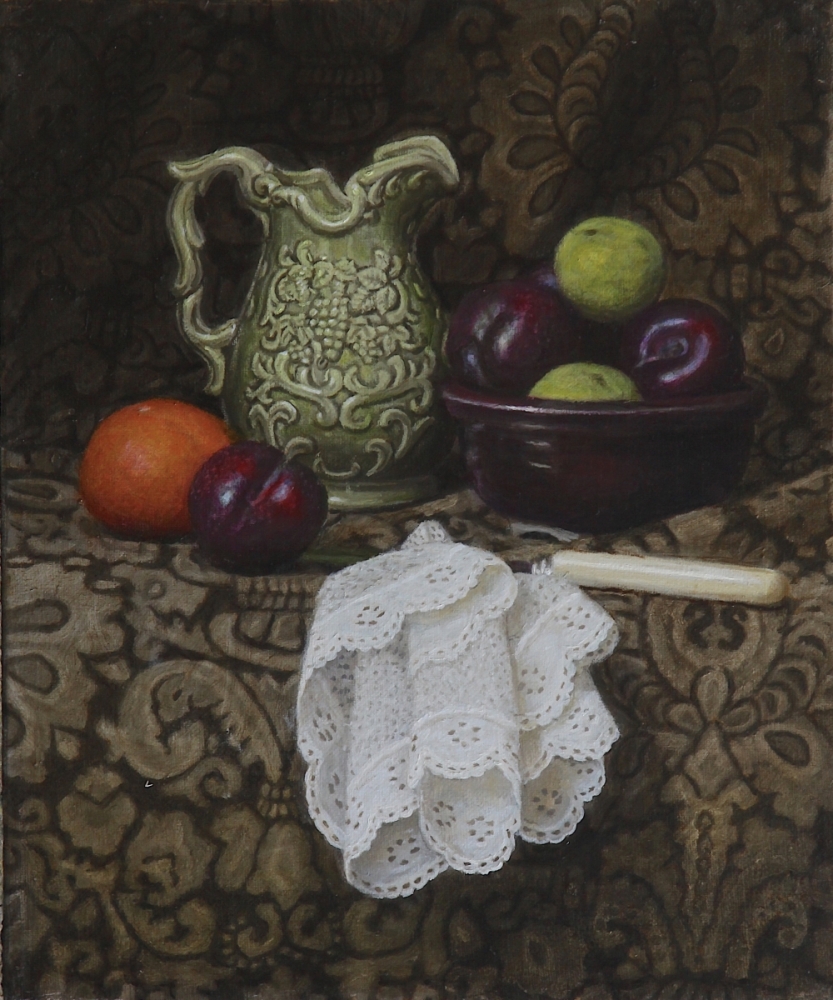 A green jug, a bowl of plums and limes, an orange