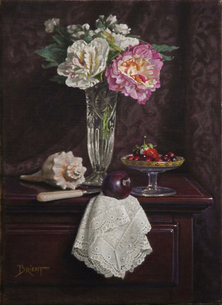 A vase of flowers, a little plate of small fruits and a sea shell  