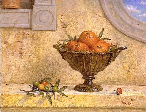 Oranges in a metallic bowl