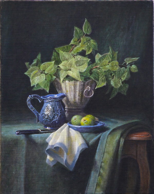 A Green plant and a plate of limes